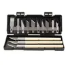 A set of carving tools and blades in a black case, shown against a white background. Produktbild-Vorschau