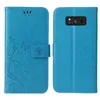 A blue flip cover phone case is shown from the front and back. Produktbild-Vorschau
