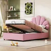 A child's bedroom with a pink upholstered bed with storage, shelves with decorations, and a colorful artwork on the wall. Anteprima dell’immagine prodotto