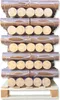 A stack of packaged wood briquettes on a wooden pallet. Produktbild-Vorschau