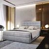 A luxurious bedroom with a large bed, bedside tables, and decorative wall panels. Produktbild-Vorschau