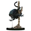 A Xenomorph figure from the Alien franchise is chained to a pole. Produktbild-Vorschau