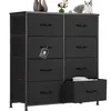 A black fabric dresser with eight drawers is shown against a white background. A small cat is sitting on top of the dresser. Voir les images du produit