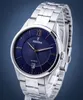 A close-up studio shot of a men's Festina watch with a blue dial and silver metal band, set against a gradient blue background. Náhľad obrázku produktu