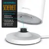 A close-up view of the base of a white electric kettle and its power base, with a black safety information overlay on the left. Náhľad obrázku produktu