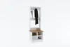 A white hall tree with a wooden top and shelves, featuring coat hooks, an umbrella, a coat, a handbag, a basket, and shoes. Produktbild-Vorschau