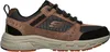 A side view of a brown Skechers walking shoe against a white background. Produktbild-Vorschau
