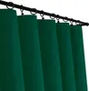 A close-up view of dark green curtains hanging from a black curtain rod. Podgląd zdjęcia produktu