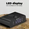 A black Denver radio alarm clock with a digital display is shown on a wooden surface, with text overlay describing its features. Podgląd zdjęcia produktu