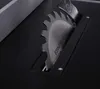 A close-up view of a circular saw blade on a black surface. Anteprima dell’immagine prodotto