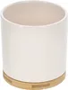 A white ceramic pot with a bamboo base. Produktbild-Vorschau