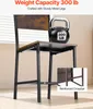 A close-up of a chair with a kettlebell on it, highlighting its weight capacity and reinforced crossbar. Anteprima dell’immagine prodotto