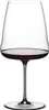 A single wine glass filled with red wine, isolated on a white background. Produktbild-Vorschau