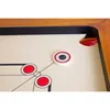 A close-up view of a carrom board with a striker. Produktbild-Vorschau