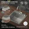 A stainless steel kitchen sink with a faucet and soap dispenser installed on a wooden countertop, with diagrams illustrating installation options. Produktbild-Vorschau