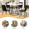 A dining set with a round marble-look table and four black chairs, shown in a room setting and with smaller inset images of different room styles. Produktbild-Vorschau