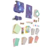 A collection of accessories for an instant camera, including a camera case, a journal, photo frames, and decorative papers. Náhled obrázku produktu