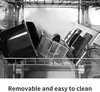 A close-up view of removable parts of a deep fryer, such as a basket and a pan, placed on a rack inside the appliance. Produktbild-Vorschau