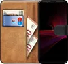 A brown leather wallet-style phone case with a Sony Xperia 5 III phone inside. The wallet section contains a bank card and euro banknotes. Náhled obrázku produktu