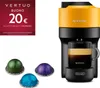 A Nespresso coffee machine with coffee capsules and a promotional coupon. Produktbild-Vorschau