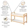 A shoe bench with two shelves, featuring padded seat and side handles, with callouts describing its features in English and German. Náhled obrázku produktu