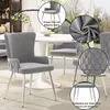 A dining room scene with multiple grey velvet chairs around a white table, with close-up insets highlighting product features. Produktbild-Vorschau