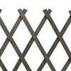 A close-up view of a gray wooden lattice fence. Náhľad obrázku produktu