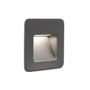 A dark gray square wall-mounted light fixture with a recessed opening emitting a soft light. Produktbild-Vorschau