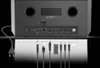 The back panel of a black Hama DAB radio is shown, with various cables and connectors laid out in front of it. Produktbild-Vorschau