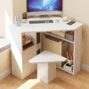 A white triangular corner computer desk with shelves, a computer monitor, keyboard, mouse, and a small stool. Náhled obrázku produktu
