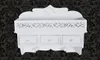 A white wall shelf with three drawers and two hooks against a dark damask patterned background. Náhled obrázku produktu