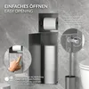 A bathroom scene showing a recessed cabinet for toilet paper and a toilet brush holder. Produktbild-Vorschau