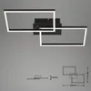 A modern LED ceiling light with two intersecting rectangular frames, shown against a plain gray background. Technical drawings with dimensions are included below the main product image. Produktbild-Vorschau