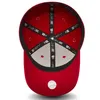The underside of a red baseball cap. Podgląd zdjęcia produktu