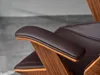 Close-up of a brown leather armchair armrest with a wooden frame. Produktbild-Vorschau