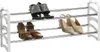 A three-tiered shoe rack with various shoes displayed on each level against a white background. Produktbild-Vorschau