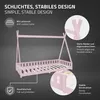 A pink tipi-style children's bed with informational callouts about its features. Produktbild-Vorschau