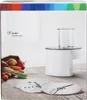 A product box showing a food processor attachment and ingredients. Produktbild-Vorschau