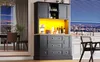 A modern black cabinet with yellow LED lighting is shown in a kitchen setting with a city view at night through the window. Podgląd zdjęcia produktu