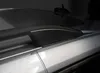 A close-up view of a car's roof rack system. Podgląd zdjęcia produktu
