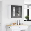 A modern wall-mounted cabinet with glass doors, displayed in a clean, well-lit kitchen or dining area. Voir les images du produit