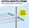 Close-up of a drying rack with text overlays highlighting its features. Voir les images du produit