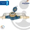 A water meter is shown mounted on a bracket, with a logo and text overlay. Produktbild-Vorschau