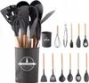 A set of 12 silicone kitchen utensils with wooden handles, displayed in a holder, alongside individual utensils arranged in rows. Náhľad obrázku produktu