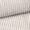 A close-up view of a beige corduroy fabric. Náhľad obrázku produktu