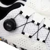 A close-up view of a white athletic shoe with a black BOA lacing system. Náhled obrázku produktu