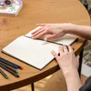 Notes A5 w linie, twarda okładka, z gumką, czarny Podgląd zdjęcia produktu 10