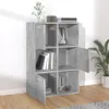 A concrete gray storage cabinet with multiple compartments, some with doors, is shown in a room setting with a plant and books. Náhled obrázku produktu