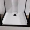 Detailbild einer weißen Duschwanne mit einer schwarzen Ablaufabdeckung in einer Komplettdusche Produktbild-Vorschau