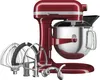 A red KitchenAid stand mixer with multiple attachments is shown against a white background. Produktbild-Vorschau